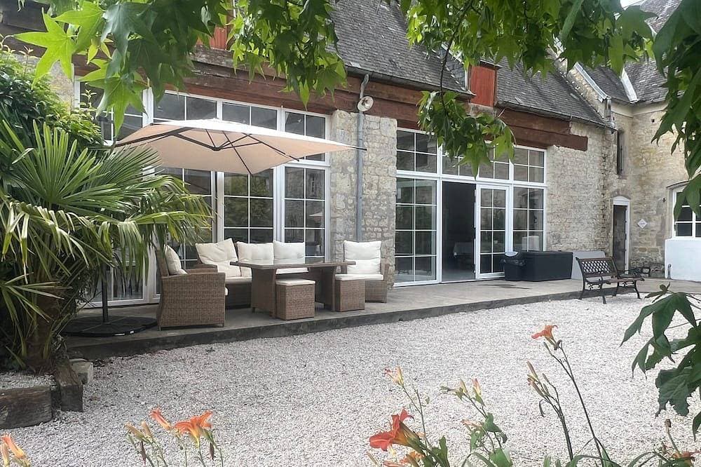 Foto 12 von 14: Cottage 'Gîte 5' mit gemeinsamer Terrasse und Garten