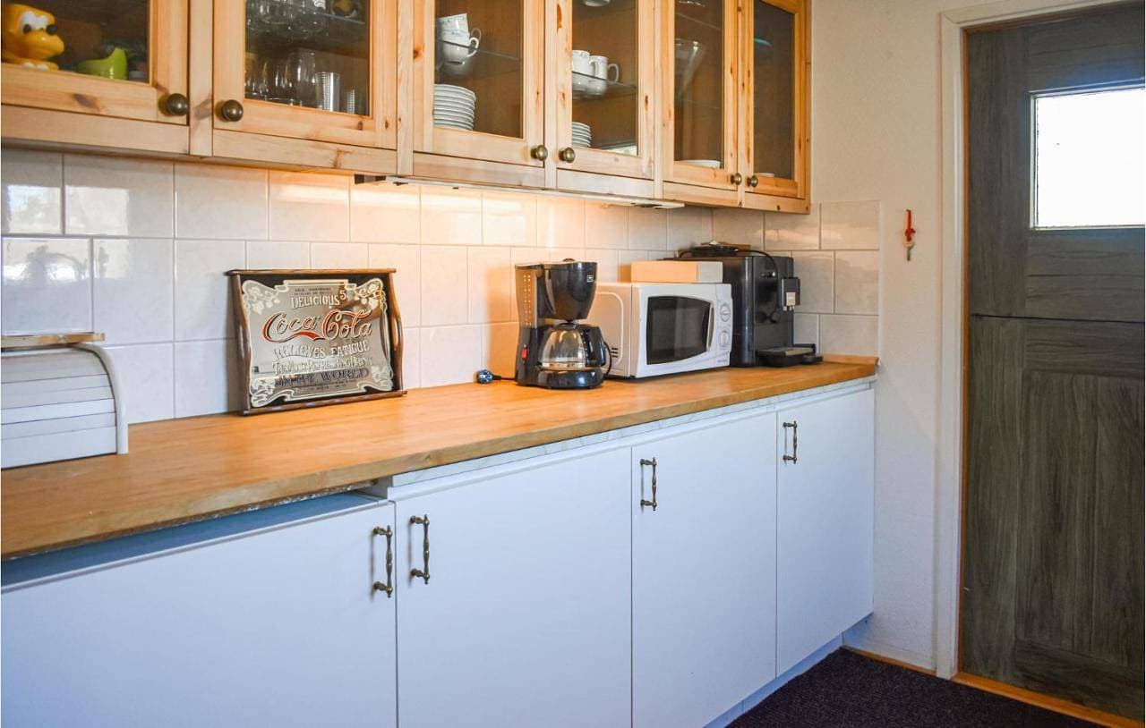 Foto 4 von 12: Four-Bedroom Holiday Home