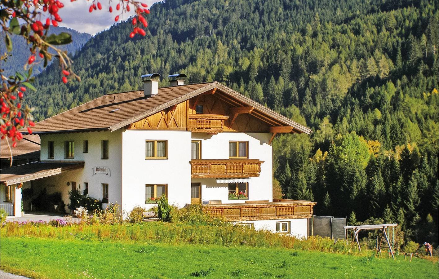 Wohnung mit Bergblick, Parkplatz und Terrasse 1