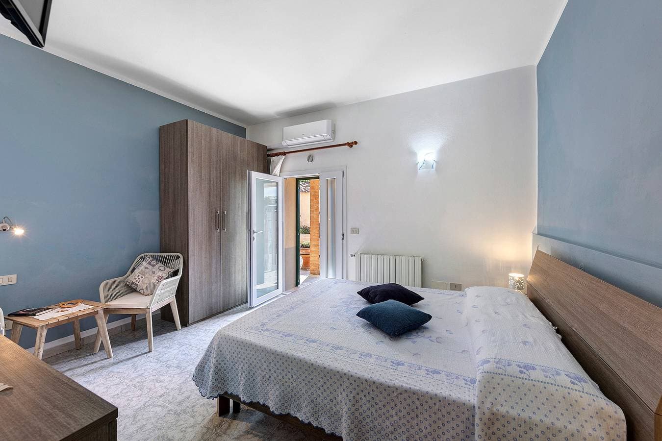 Foto 2 von 33: Zimmer 'Agriturismo Case Nuove - Camera Ste' mit Gemeinschaftspool, WLAN und Klimaanlage