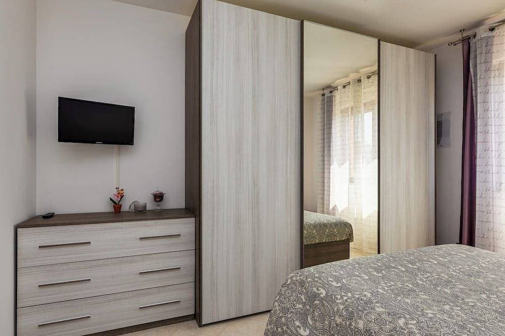 Foto 4 von 18: Casa Confortevole Terrazzo e Posto Auto Coperto!