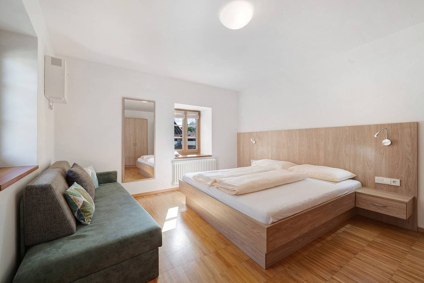 Foto 4 von 17: Ferienwohnung "Wielander A Ost" mit Bergblick, Gemeinschaftsgarten und WLAN