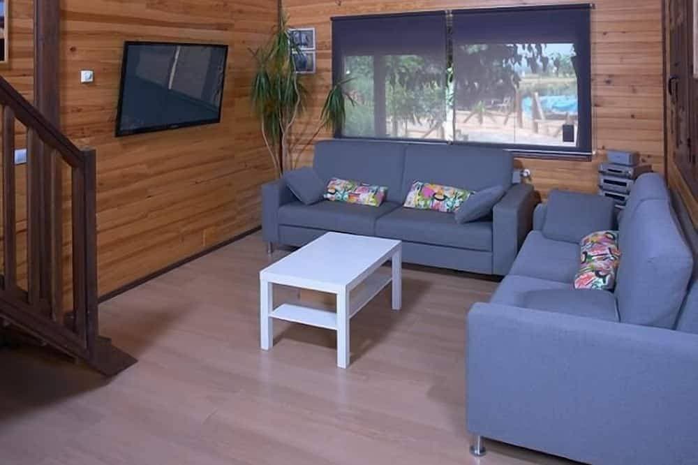 Foto 6 von 21: Holzhaus mit Platz für 12 Personen mit Pool