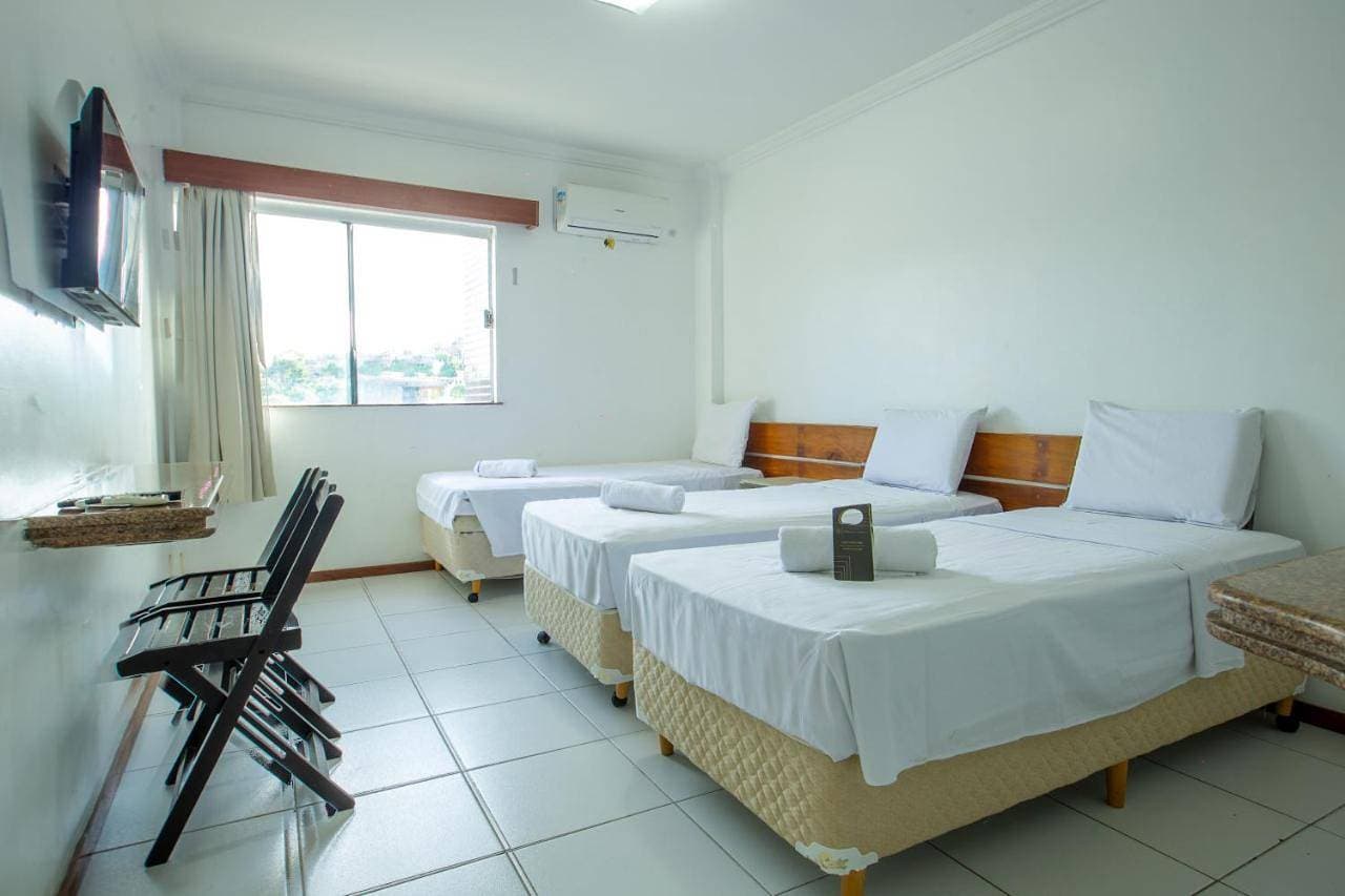 Foto 11 von 11: Triple Room with City View