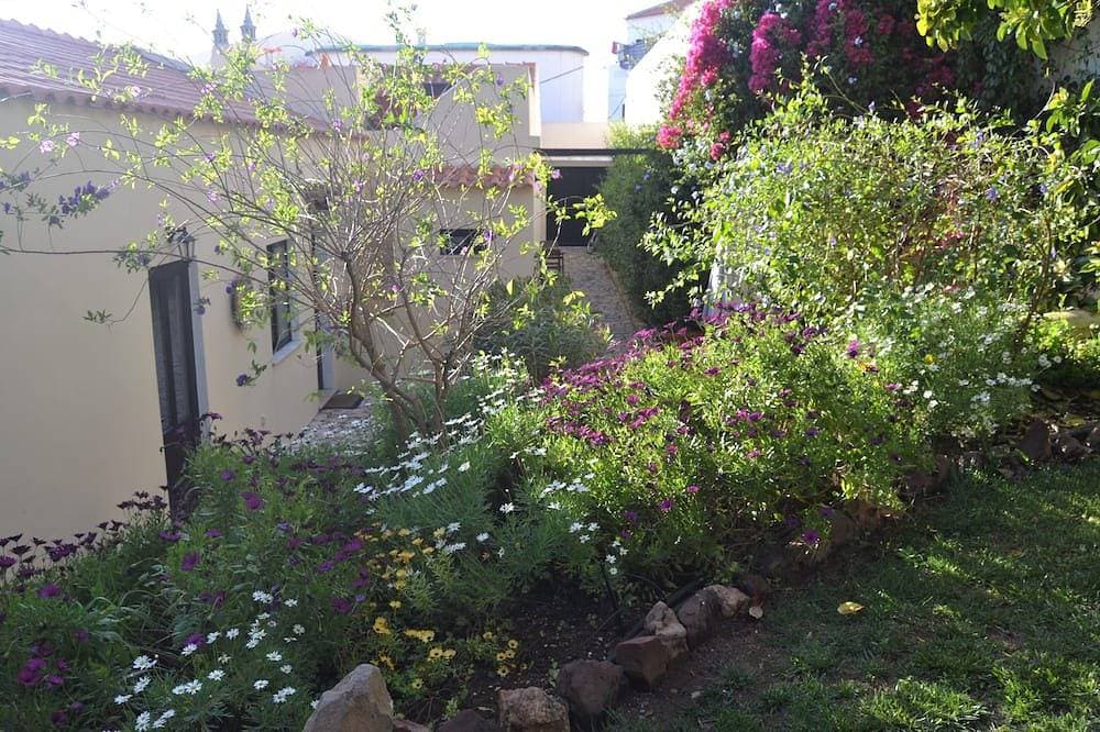 Foto 8 von 20: 2 Schlafzimmer Reihenhaus mit charmantem Garten im historischen Zentrum von Silves