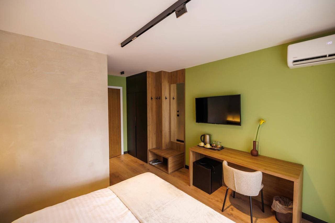 Foto 7 von 11: Double Room with Balcony (2 Adults + 1 Child)