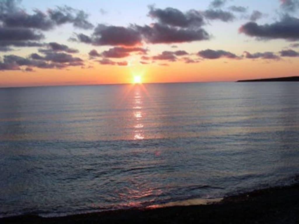 Foto 6 von 19: Sunsets, barbecue`s and sandy beach - Cabaneaux 4