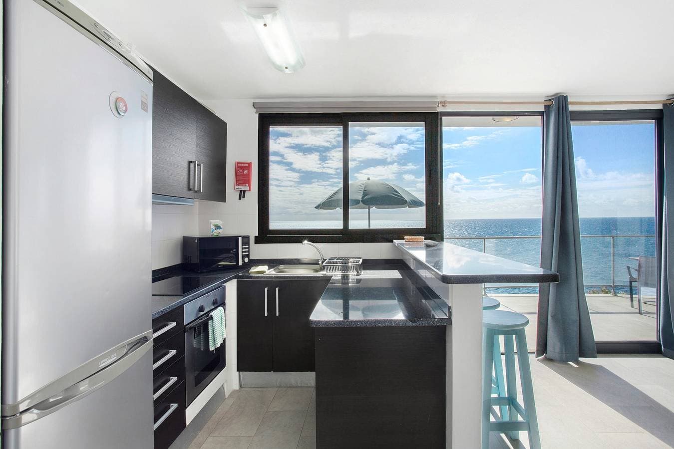 Foto 11 von 33: Ferienwohnung 'Original Wave House' mit Meerblick, Wi-Fi und Klimaanlage