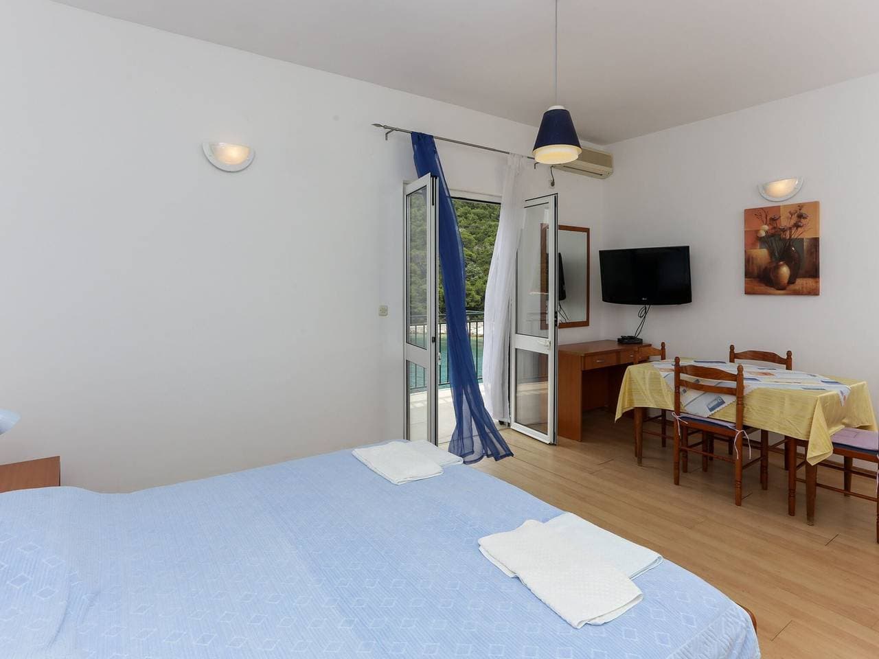Foto 5 von 16: Apartments Posta - Studio with Balcony and Sea View - Apartman 2