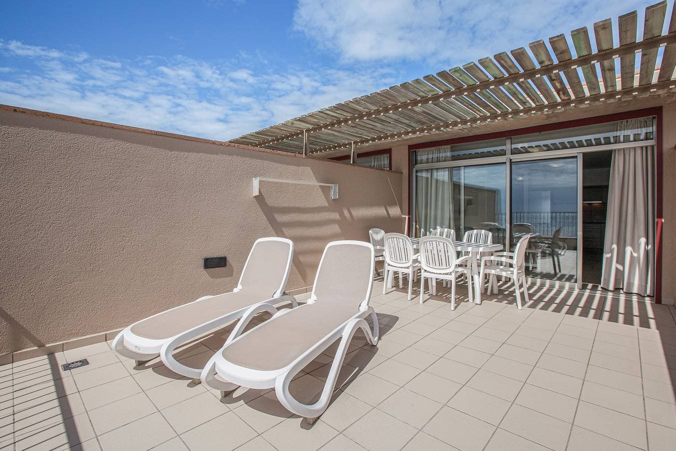 Foto 4 von 22: Ferienwohnung "Casa Médano 18" mit Blick auf das Meer und die Berge und WLAN