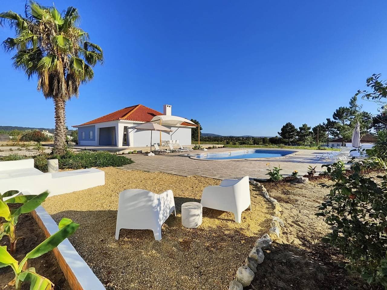 Foto 3 von 33: Ferienhaus 'Palmela Sunset Villa' mit Bergblick, privatem Pool und WLAN