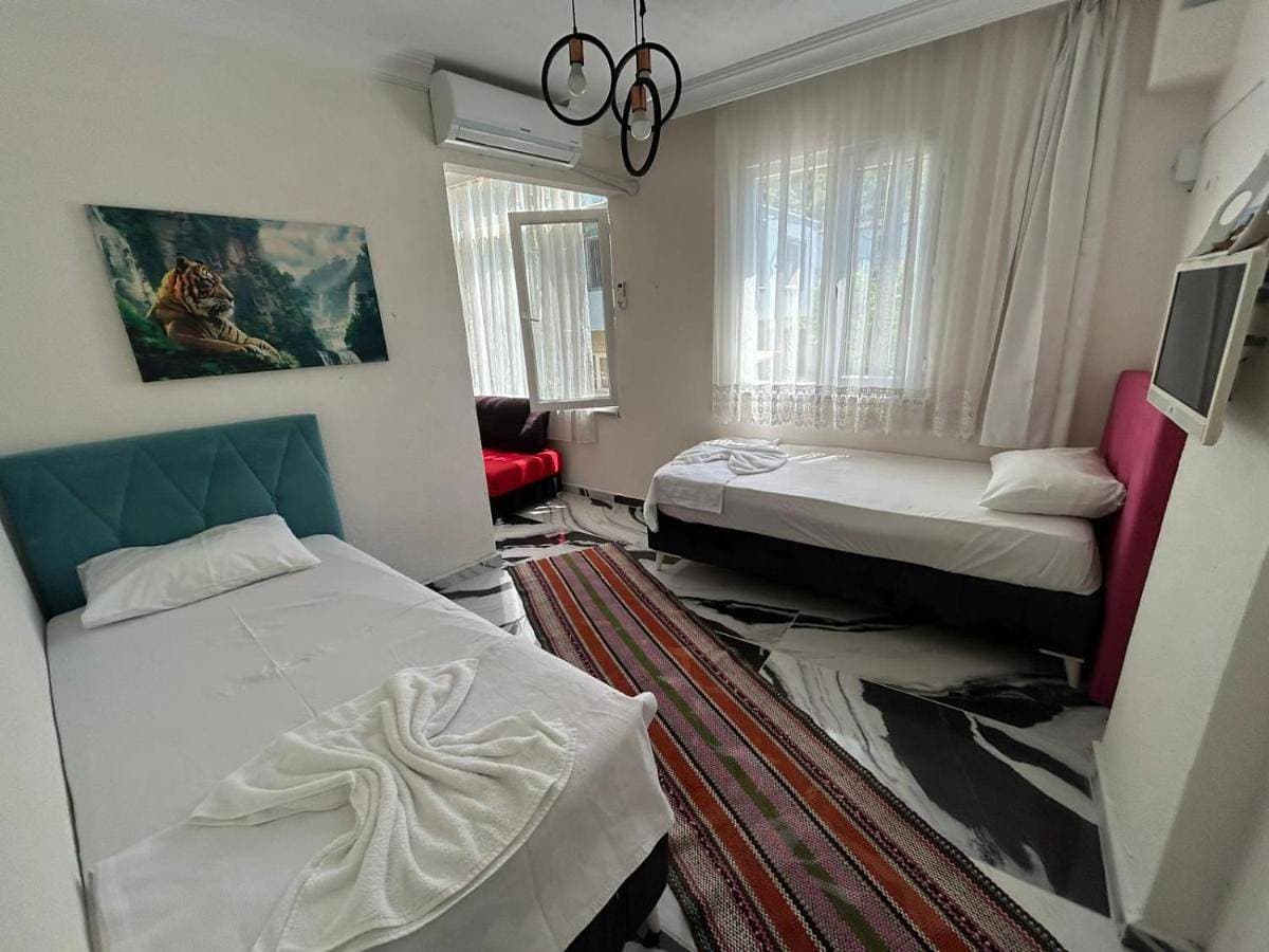 Foto 5 von 13: Deluxe Two-Bedroom Apartment with Garden View