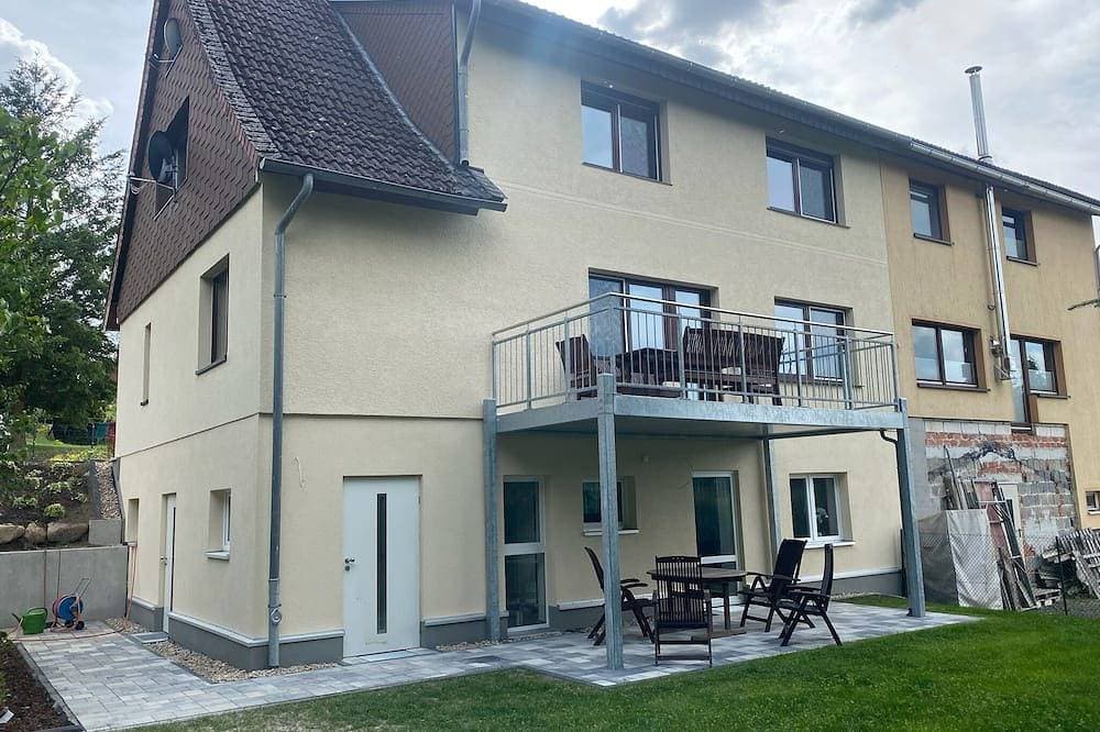 Ferienhaus Oberharzruhe - Souterrain \"Fuchsbau\" für 2 P. überdachter Terrasse 1
