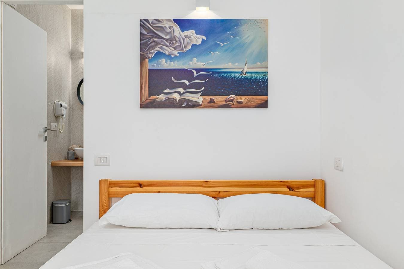 Foto 5 von 26: Appartement 'Ghjlgolu Suites - Zimmer Molara' mit WLAN und Klimaanlage
