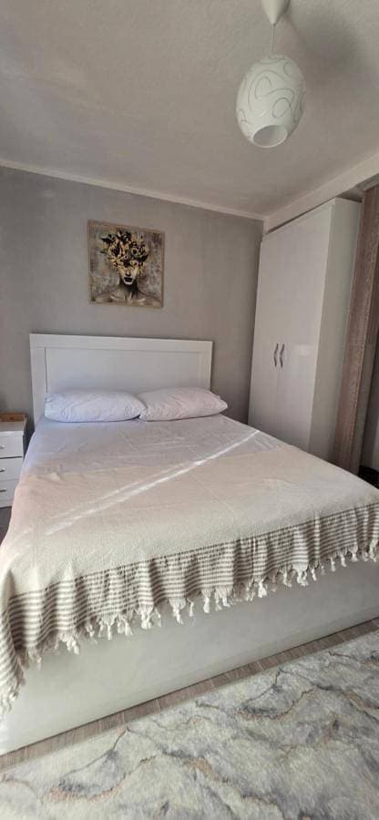Foto 4 von 11: Double Room with Shared Bathroom