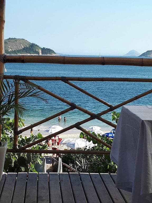 Foto 7 von 36: Camboinhas Ap. Mit Panoramablick auf den Strand