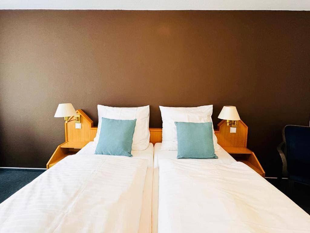 Foto 2 von 9: Economy Double Room
