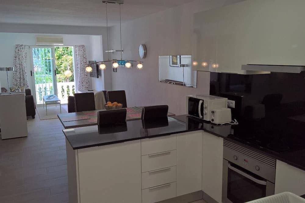 Foto 13 von 30: Albir Apartment in Haus mit Gemeinschaftspool, mit dem Garten