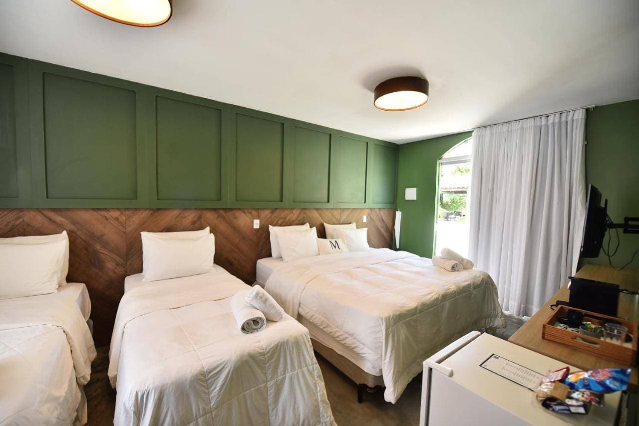 Foto 10 von 22: Triple Room with Garden View
