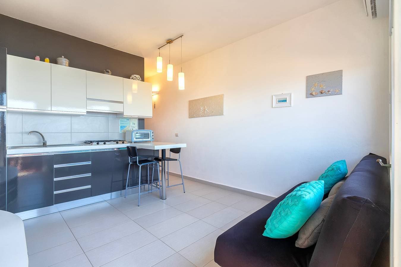 Foto 7 von 24: Ferienhaus 'Gloria' mit Gemeinschaftsterrasse und Klimaanlage