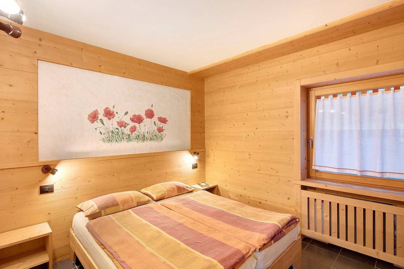 Foto 10 von 21: Ferienwohnung 'Residenz Attila Giardino' mit Bergblick, Gemeinschaftsgarten & WLAN