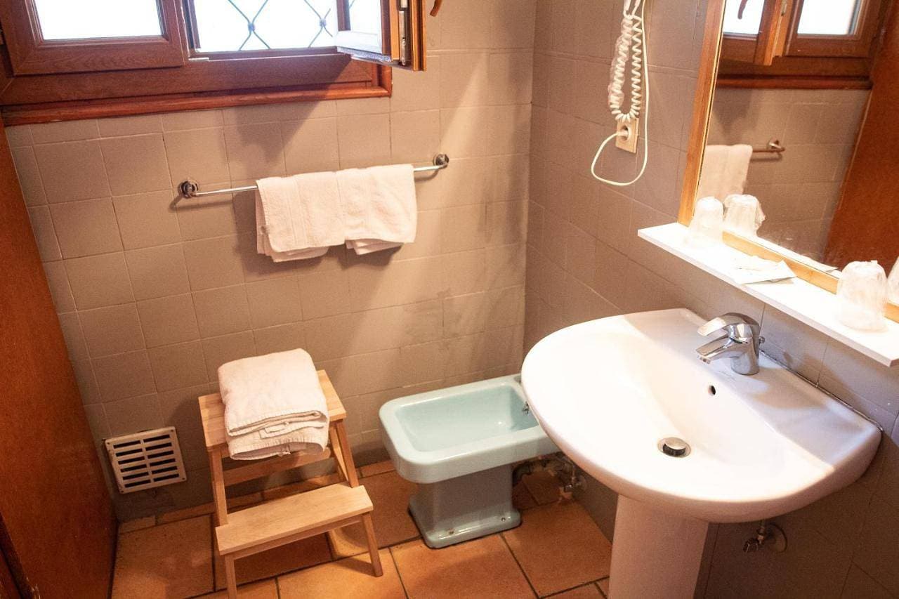 Foto 9 von 11: Triple Room with Bath