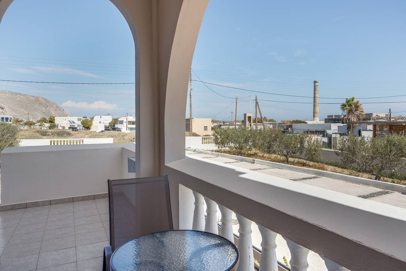 Foto 5 von 20: Ferienwohnung '08 Doppelzimmer Perivolos Strand' mit Bergblick und Klimaanlage