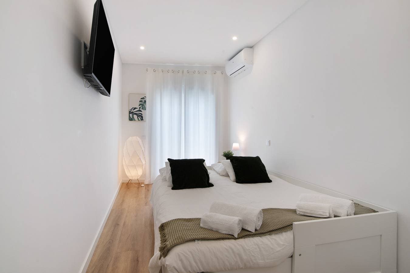 Foto 13 von 24: Ferienwohnung 'Downtown Lux' mit gemeinsamer Terrasse, Wi-Fi und Klimaanlage