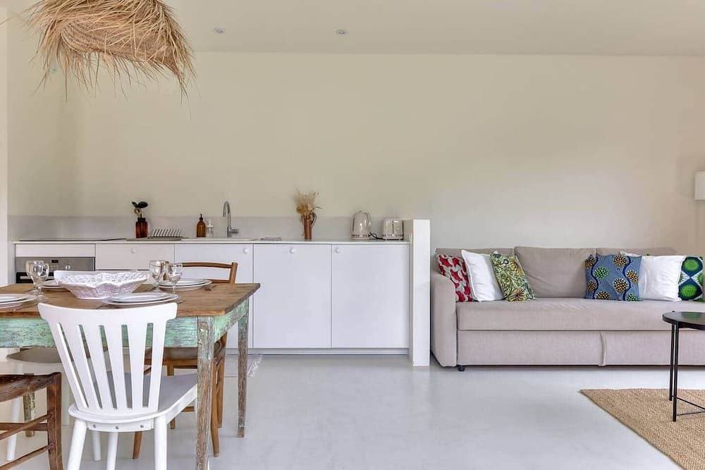 Foto 10 von 25: Casa ZaO Jolie maison en bois brut de 50m2 à