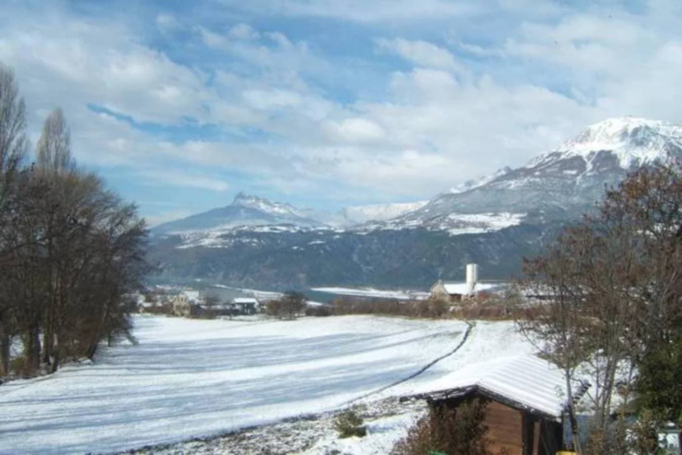 Foto 12 von 21: Ferienwohnung mit See- und Bergblick