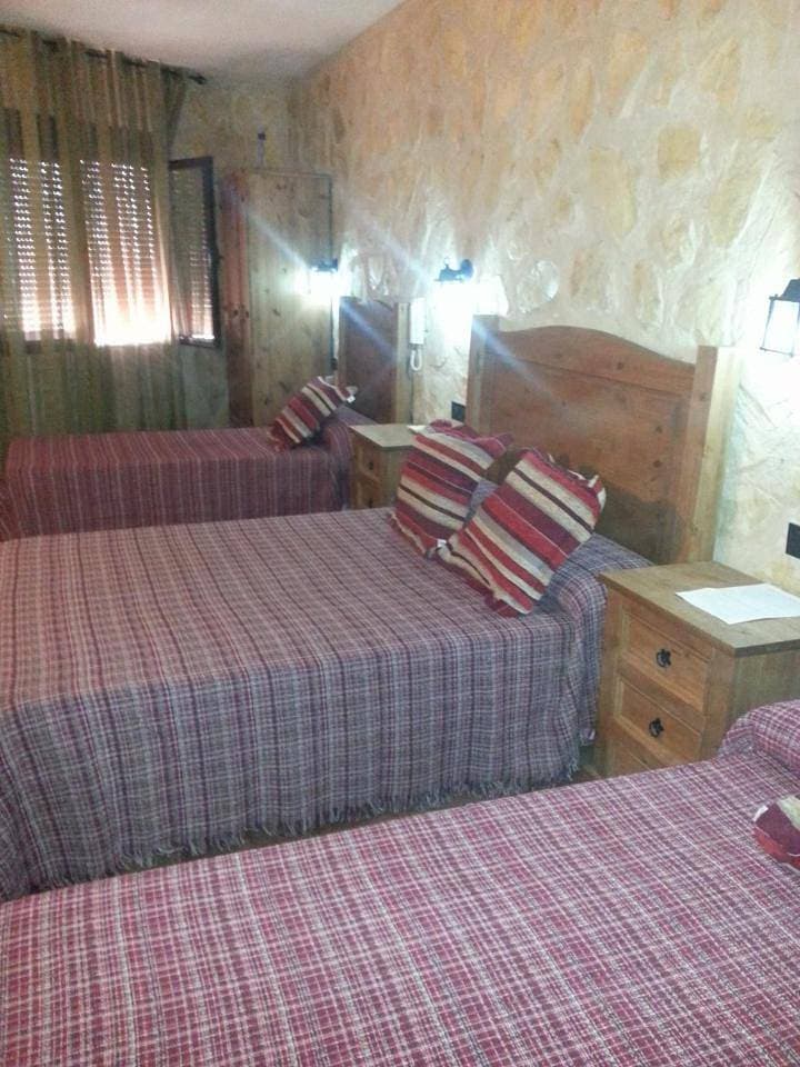 Foto 7 von 27: Quadruple Room