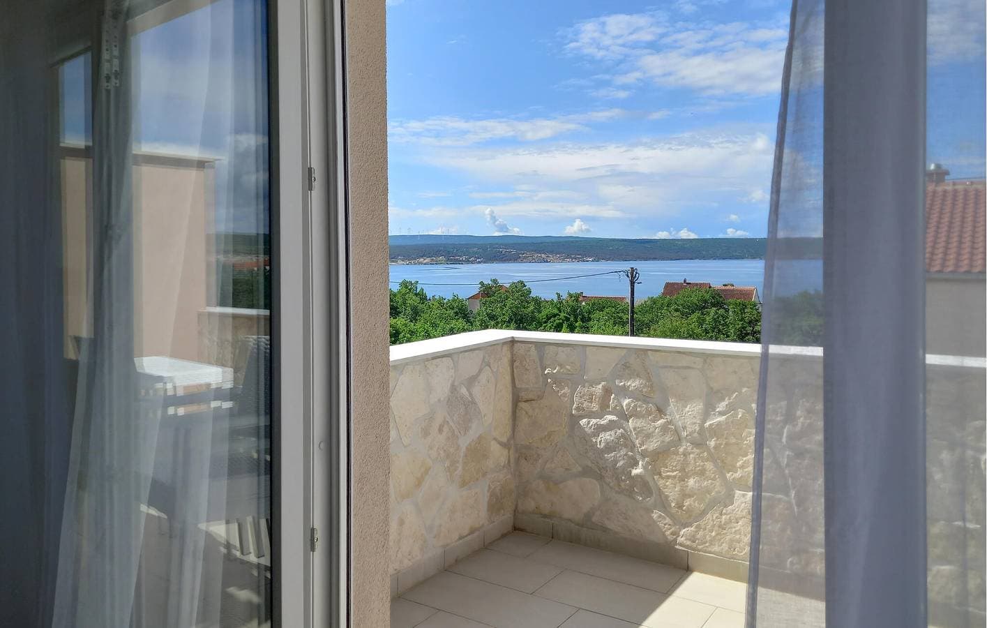 Foto 10 von 29: Urlaub am Meer: Gemütliche Ferienwohnung mit Terrasse, Küche und Parkplatz
