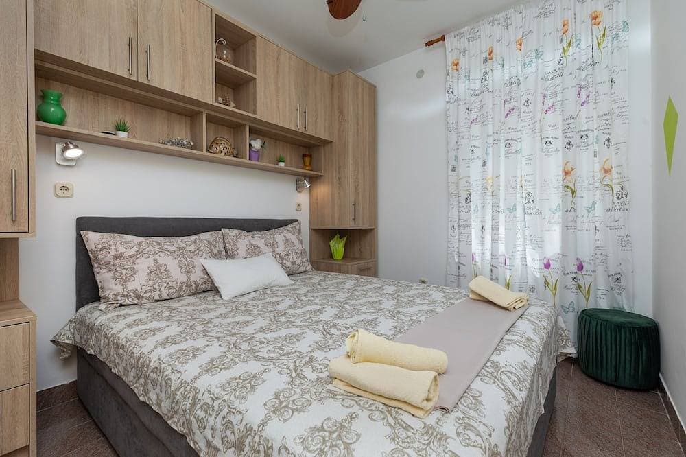 Foto 3 von 17: 2-Zimmer-Ferienwohnung mit Pool am Strand Zavode, Omis