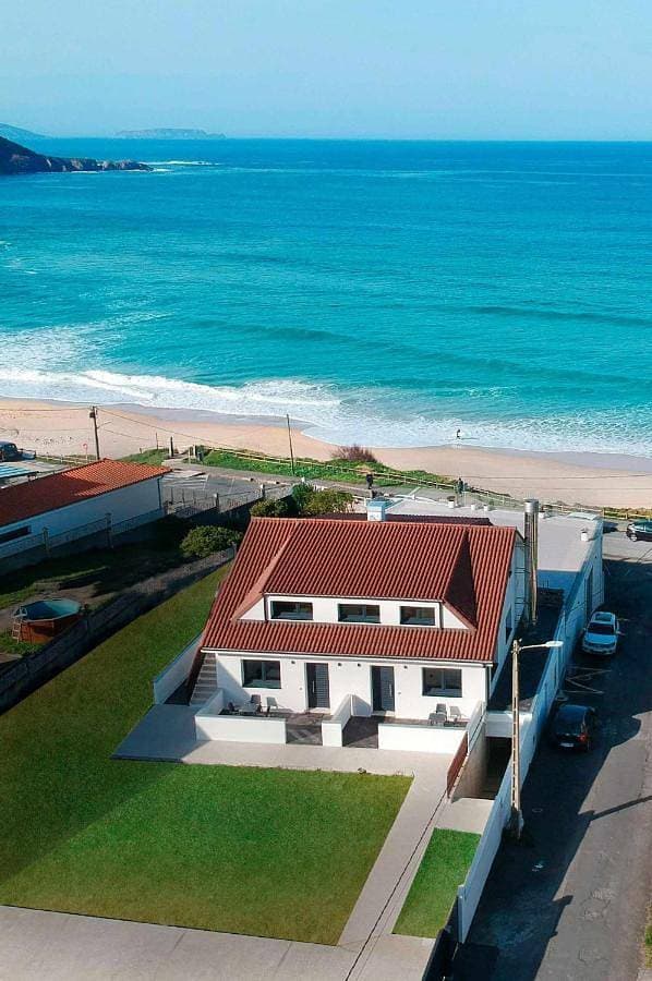 AG Casa Arnados,1ª linea de playa Razo con jardín 1