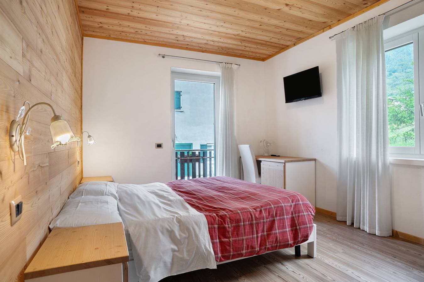 Foto 5 von 32: Ferienwohnung 'Agritur Montibeller Fravort' mit Bergblick, Gemeinschaftsgarten und Wi-Fi