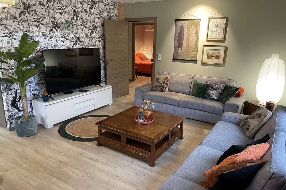 Foto 4 von 6: Jungle - Air-conditioned 4* apartment with terrace and mountain views
