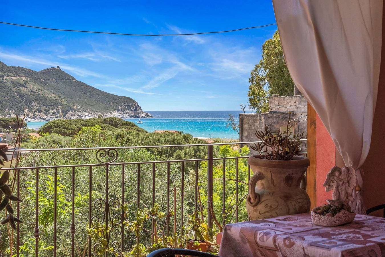Foto 2 von 25: Ferienhaus 'Villetta Degli Oleandri' mit Meerblick, privater Terrasse und Klimaanlage