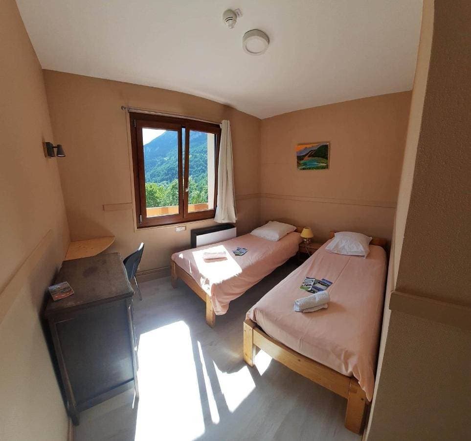 Foto 5 von 44: Economy Quadruple Room with Shared Bathroom