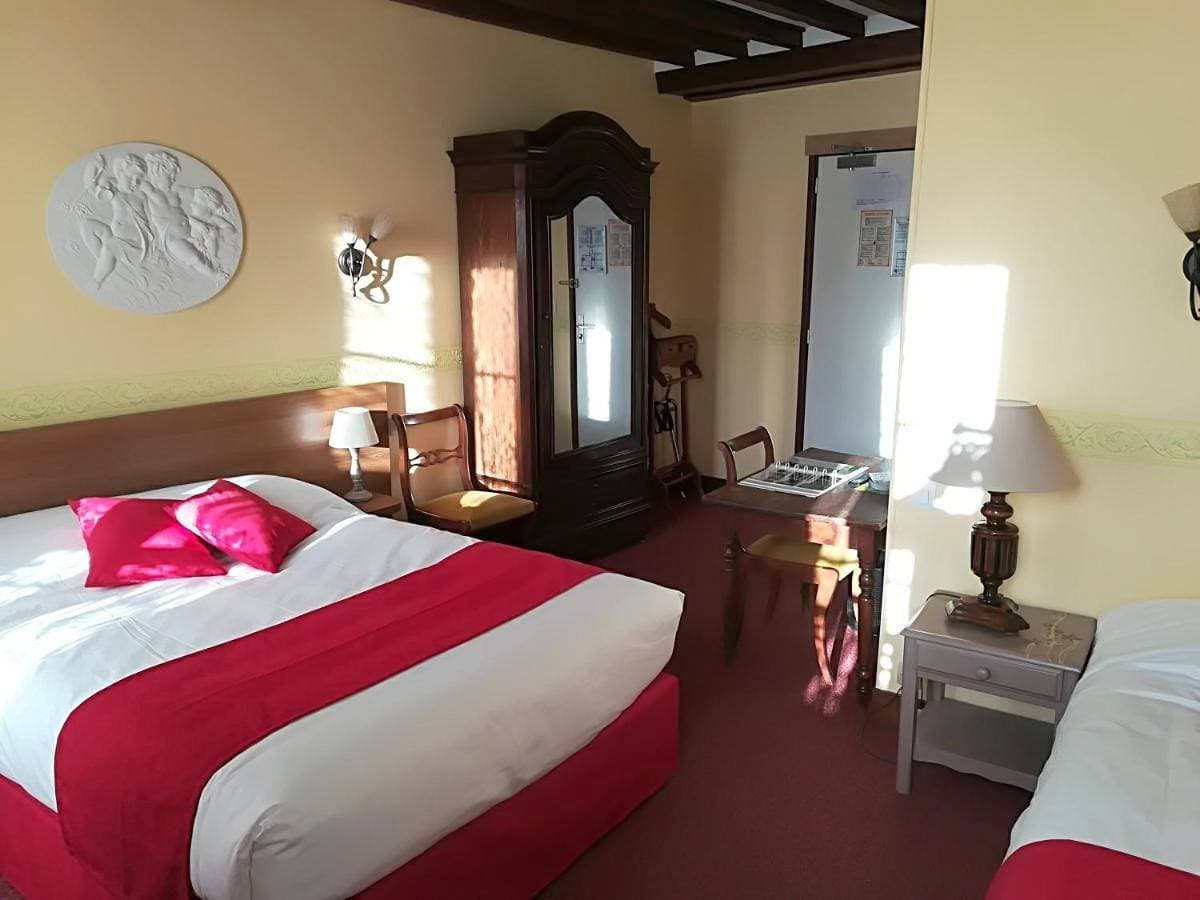 Foto 2 von 9: Triple Room
