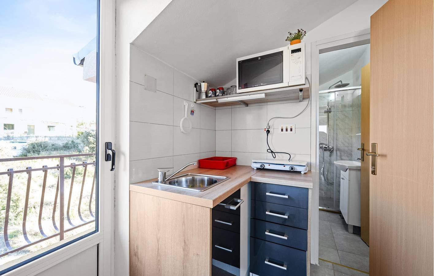 Foto 4 von 26: Apartment am Meer mit Terrasse, Küche und Parkplatz – 700 m vom Camp Vala entfernt