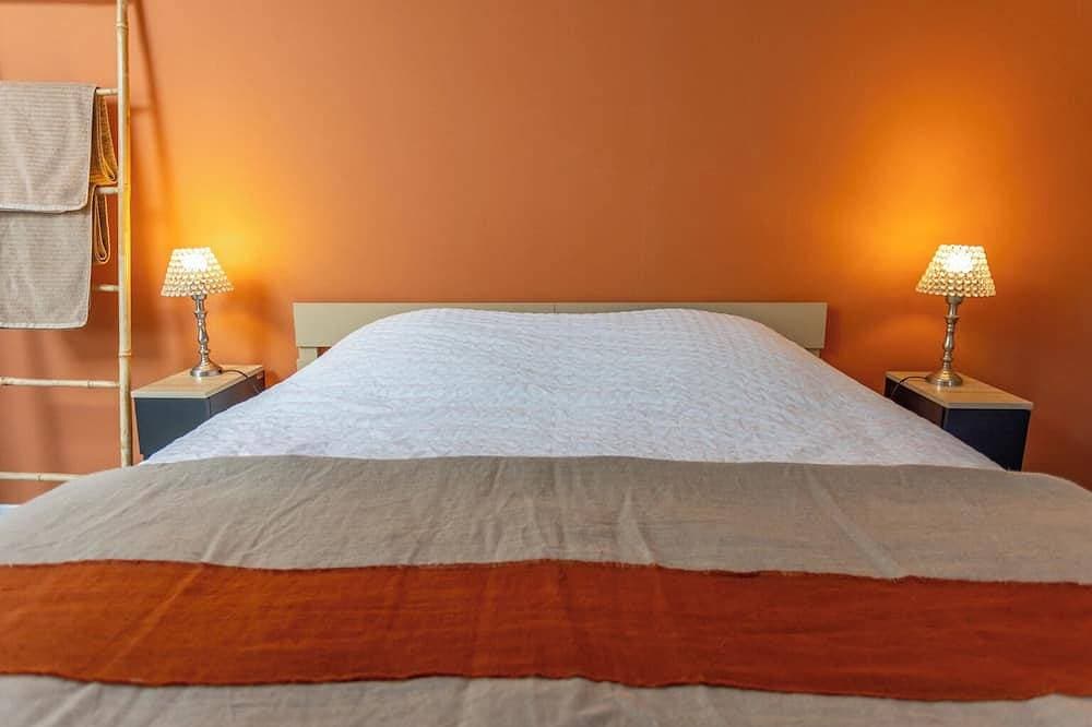 Foto 2 von 8: Chambre Double Dans Maison Face à la Plage de Saint Colomban