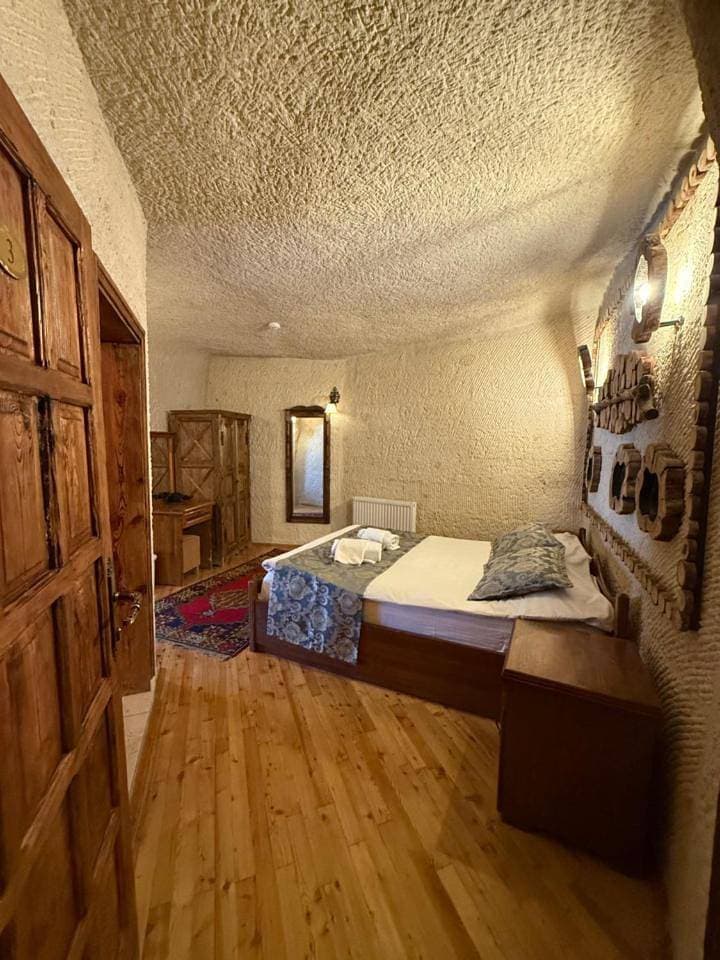 Foto 9 von 11: Panaromic Cave Room
