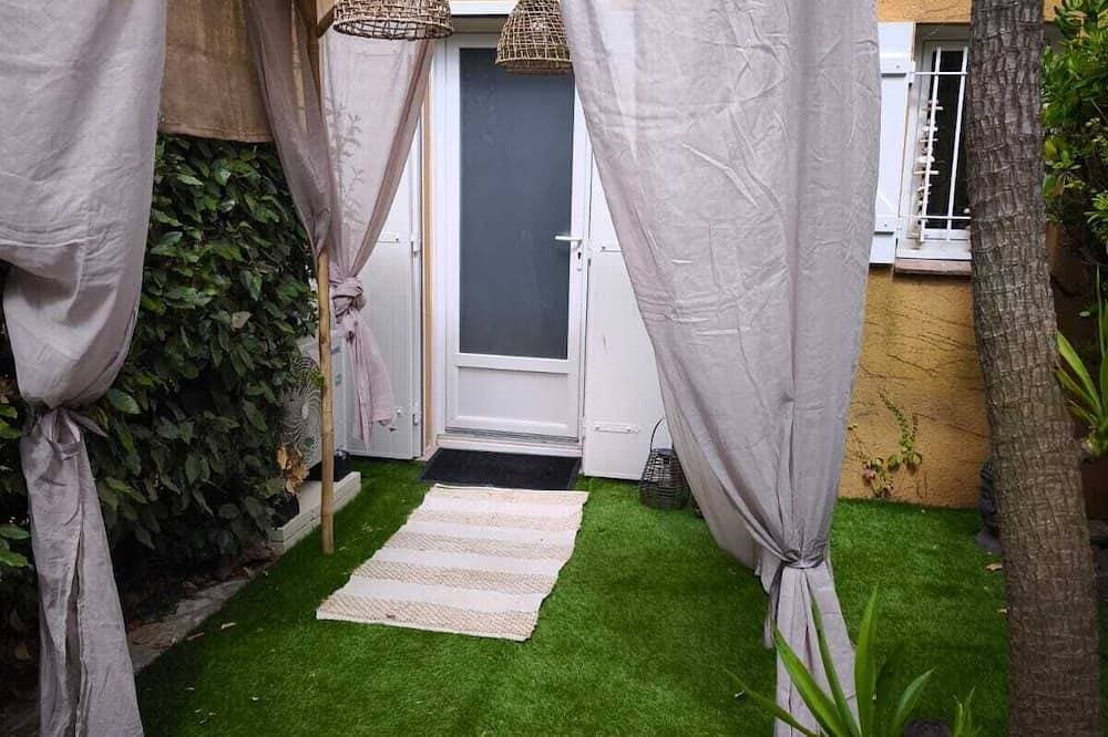 Foto 8 von 30: Gemütliche klimatisierte Wohnung mit Privatgarten, Pool & Parkplatz