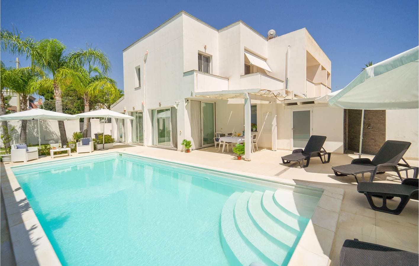 Appartement am Pool mit Meerblick 1