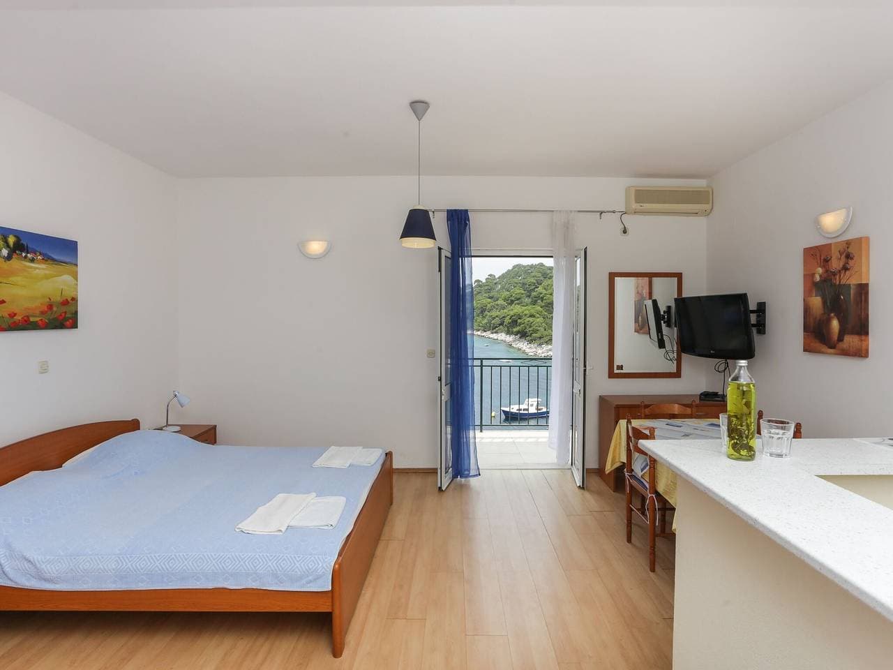 Foto 13 von 16: Apartments Posta - Studio with Balcony and Sea View - Apartman 2