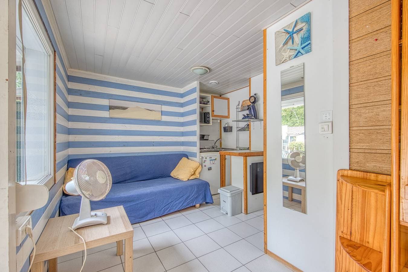 Foto 2 von 33: Ferienwohnung 'Chalet B Village Vacances' mit Gemeinschaftspool, privater Terrasse und WLAN