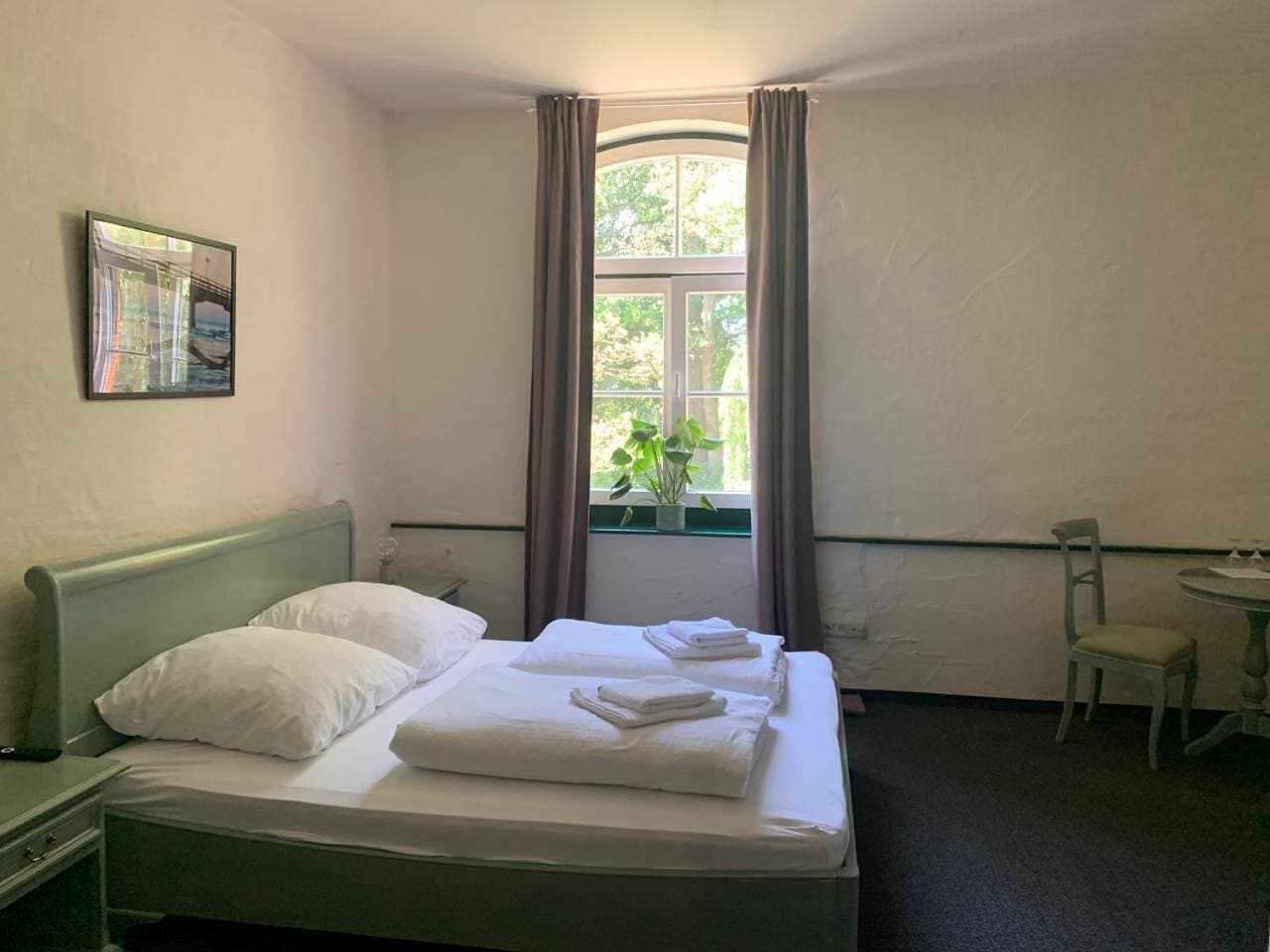 Foto 12 von 16: Double Room with Private Bathroom