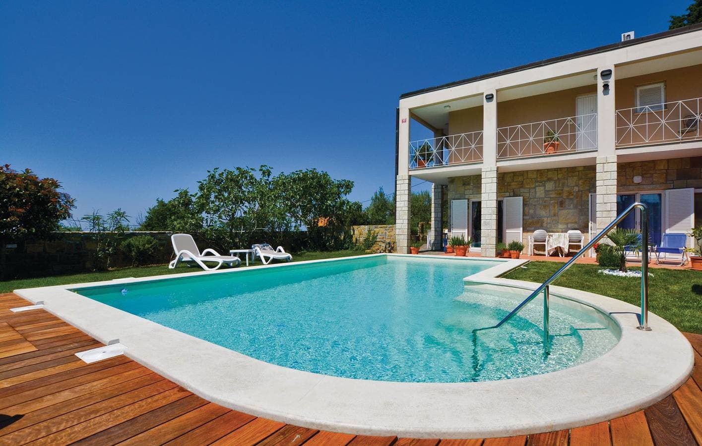 Foto 2 von 17: Ferienwohnung für 4 Personen mit Pool