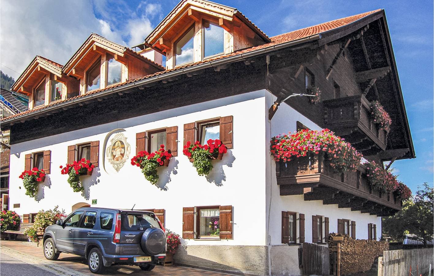Wohnung mit Bergblick, Parkplatz und Terrasse 1