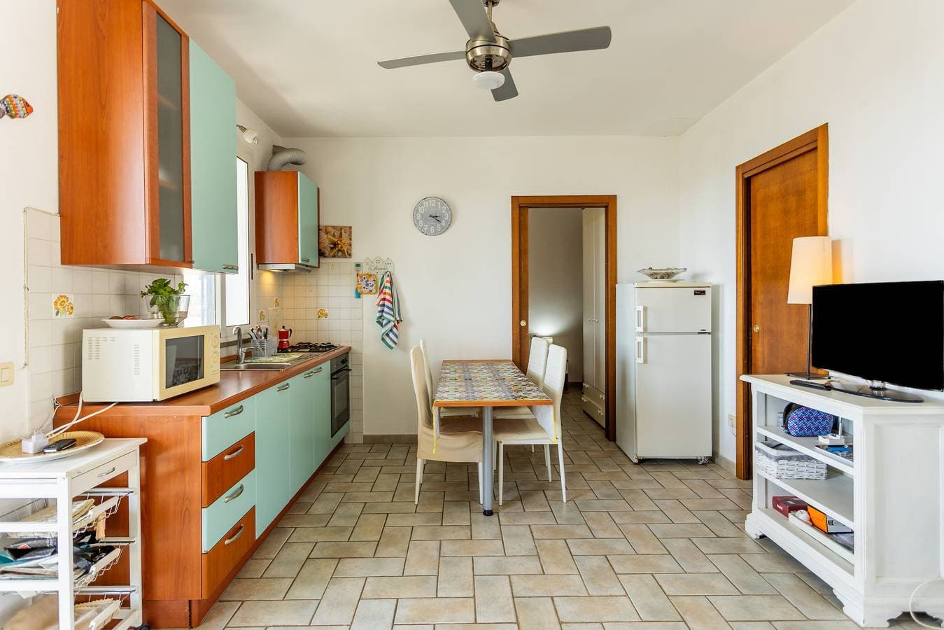 Foto 10 von 24: Ferienhaus 'Am Hafen – nur Schritte vom Meer' mit Meerblick, privater Terrasse & Klimaanlage